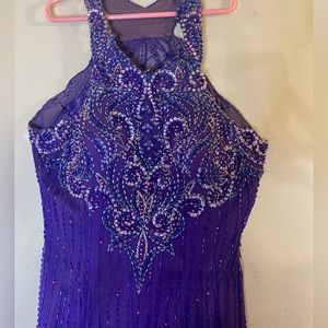 Fabulous, vintage, beaded gown with side zipper and front slit.
